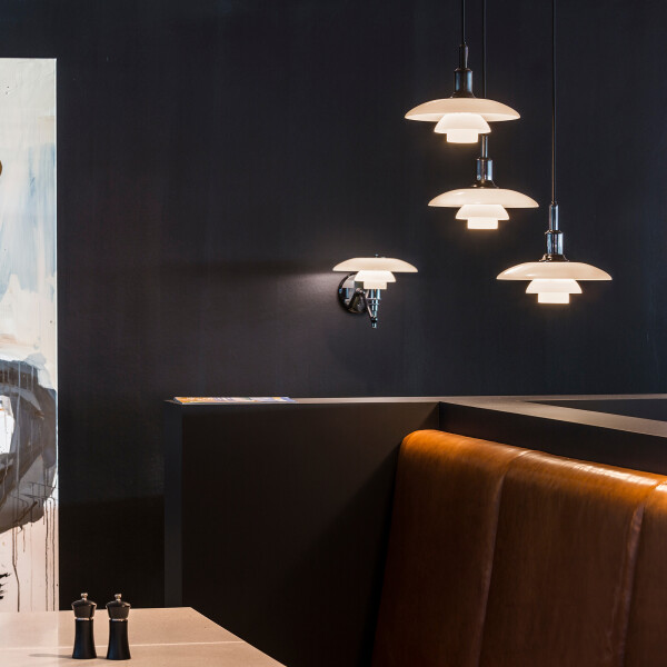 louis poulsen PH 3/2 black pendant & wall restaurant image