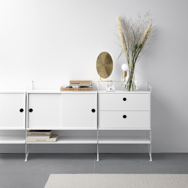 string system olohuone valkoinen kaappi laatikosto kuva