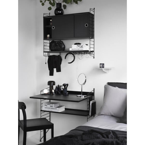 String System bedroom workspace black floor and wall panels kuva