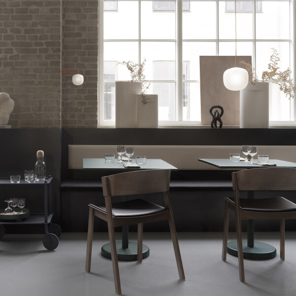 Muuto linear steel cafe table dark green interior image