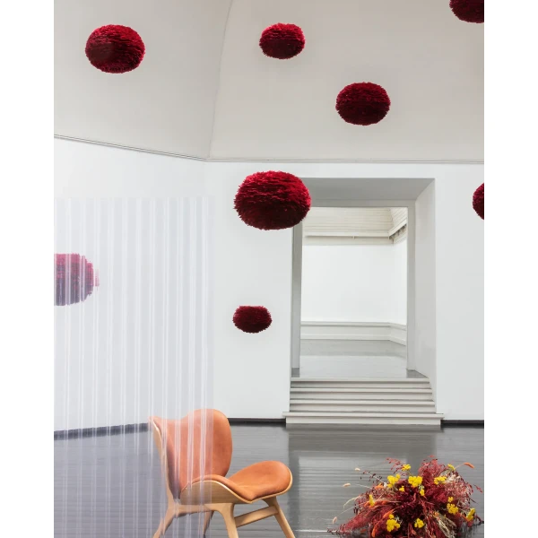 UMAGE lifestyle Eos red A Conversation Piece leather kuva