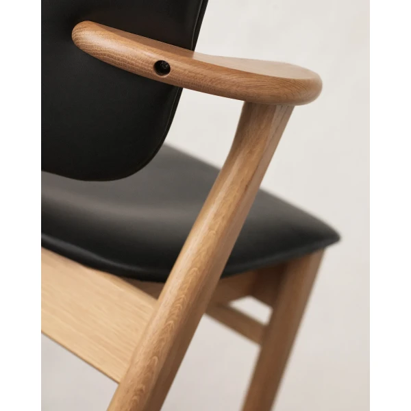 Domus Chair birch black leather upholstery armrest and back close up master kuva