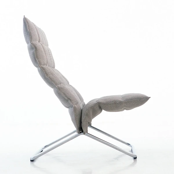 wide k chair with tubular feet upholstery Sand stone black side Woodnotes kuva